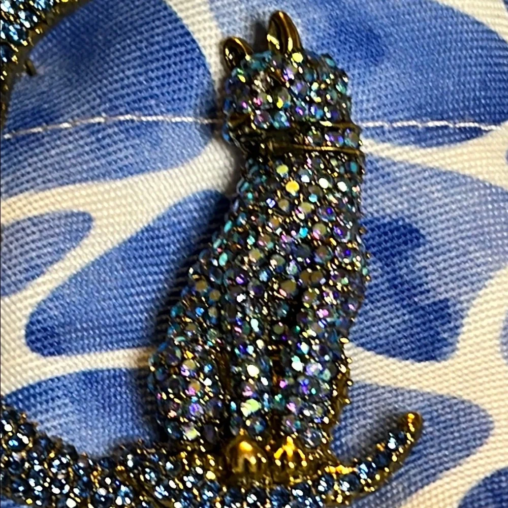 BETSEY Johnson’s Sparkling Blue and Gold Cat Brooch